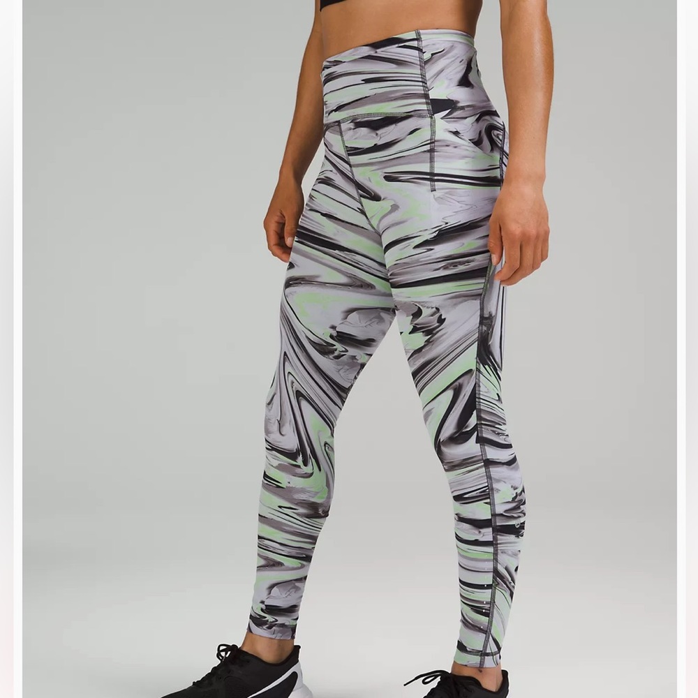 Lululemon swift speed high rise tight, 28 inch.  size 4.  Like new!
